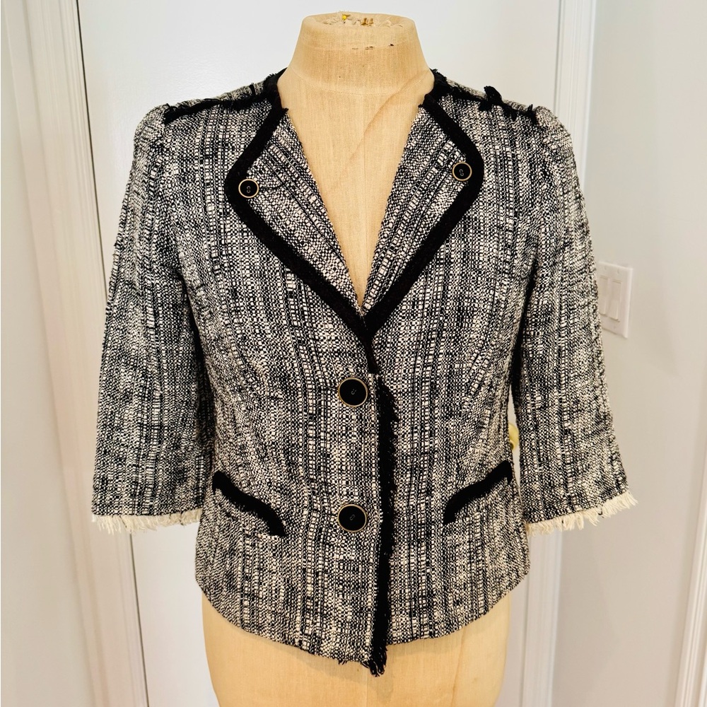 Trina Turk - tweed black and white size 12 jacket.
Cotton, wool and polyester